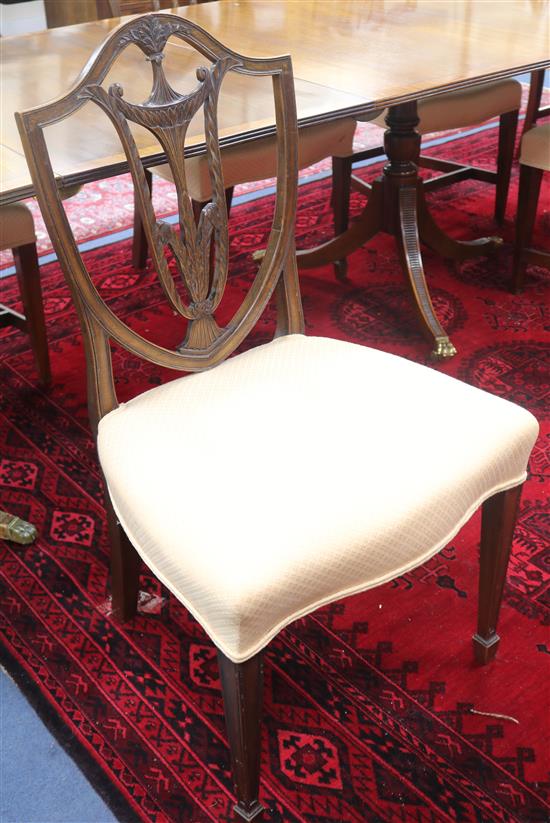 A set of six shield back dining chairs and a pair of dining chairs